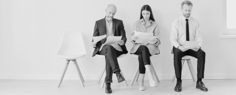 people waiting for interview with resumes